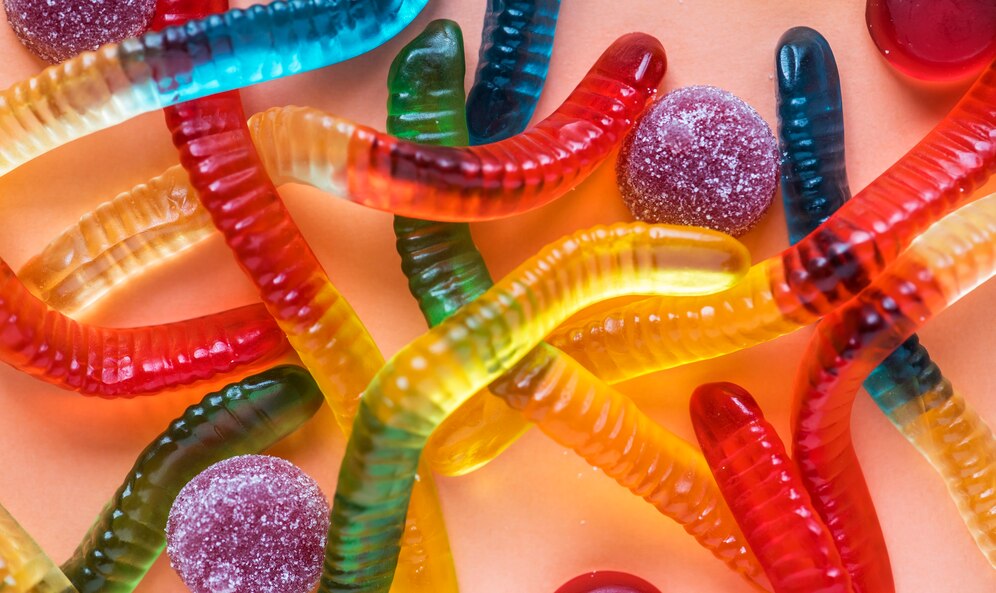 gummy worms to represent worms in your poop