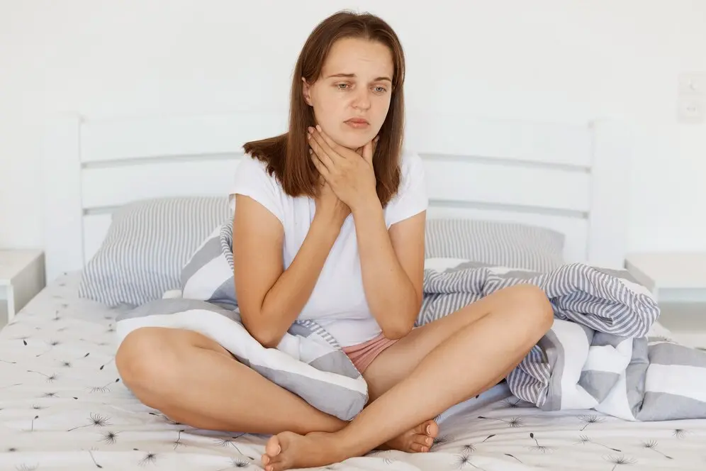 girl with swollen tonsils and white spots in miami