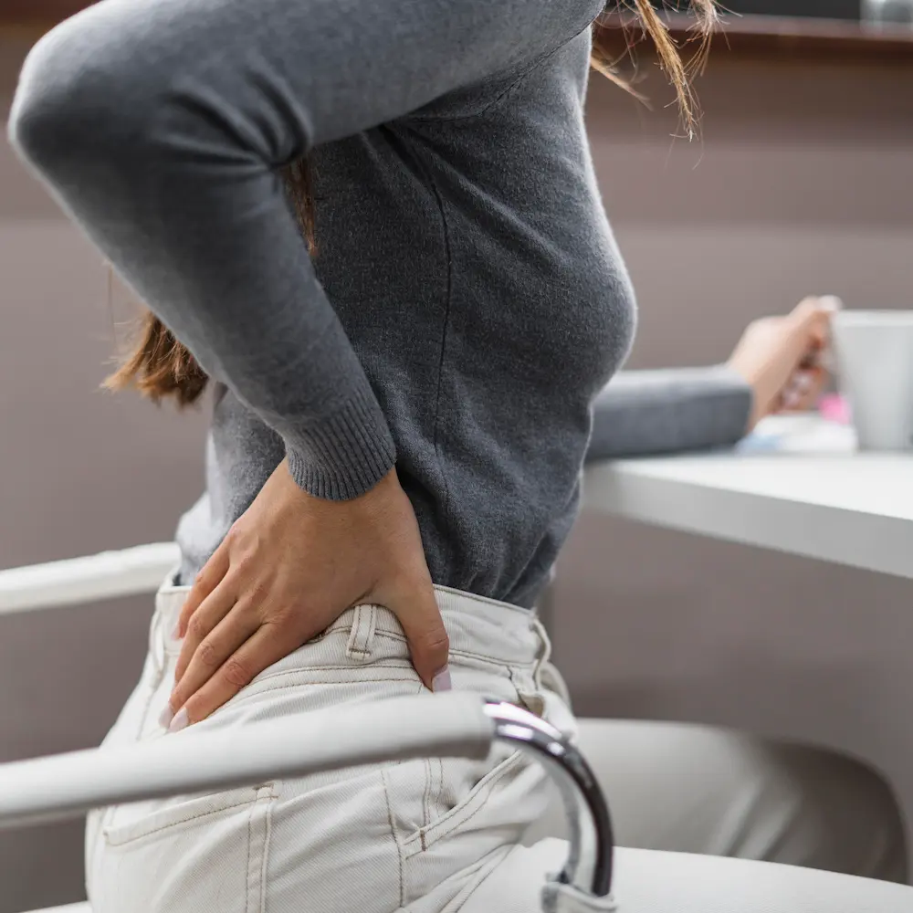 a woman suffering from herniated disc healing