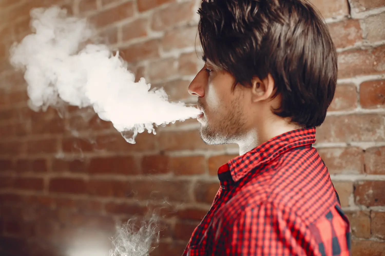 a man smoking tobacco wondering the short term effects of tobacco