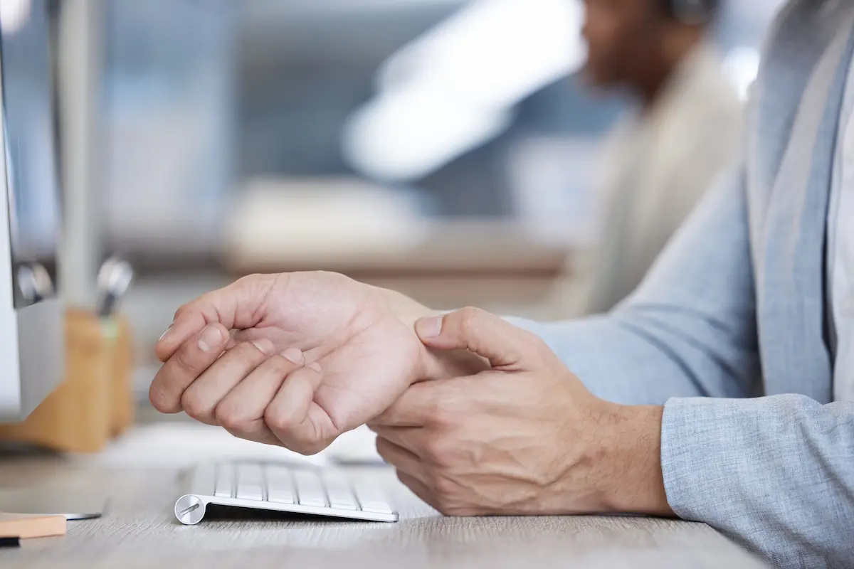 a man wondering what kind of doctor treats carpal tunnel