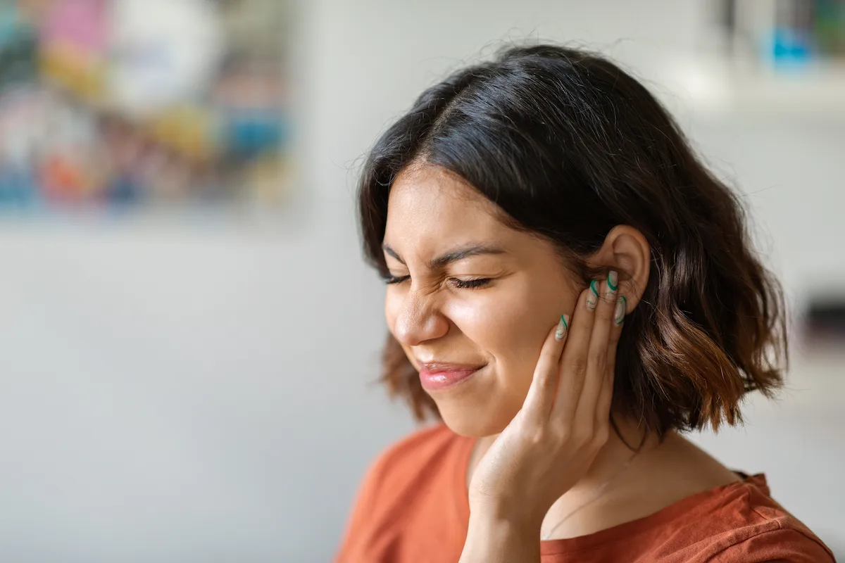 a woman wondering are ear infections contagious