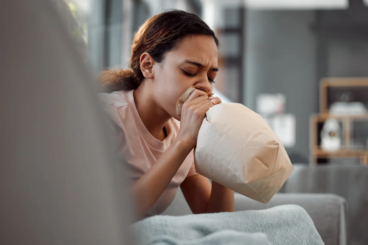 a woman wondering how to distract yourself during a panic attack