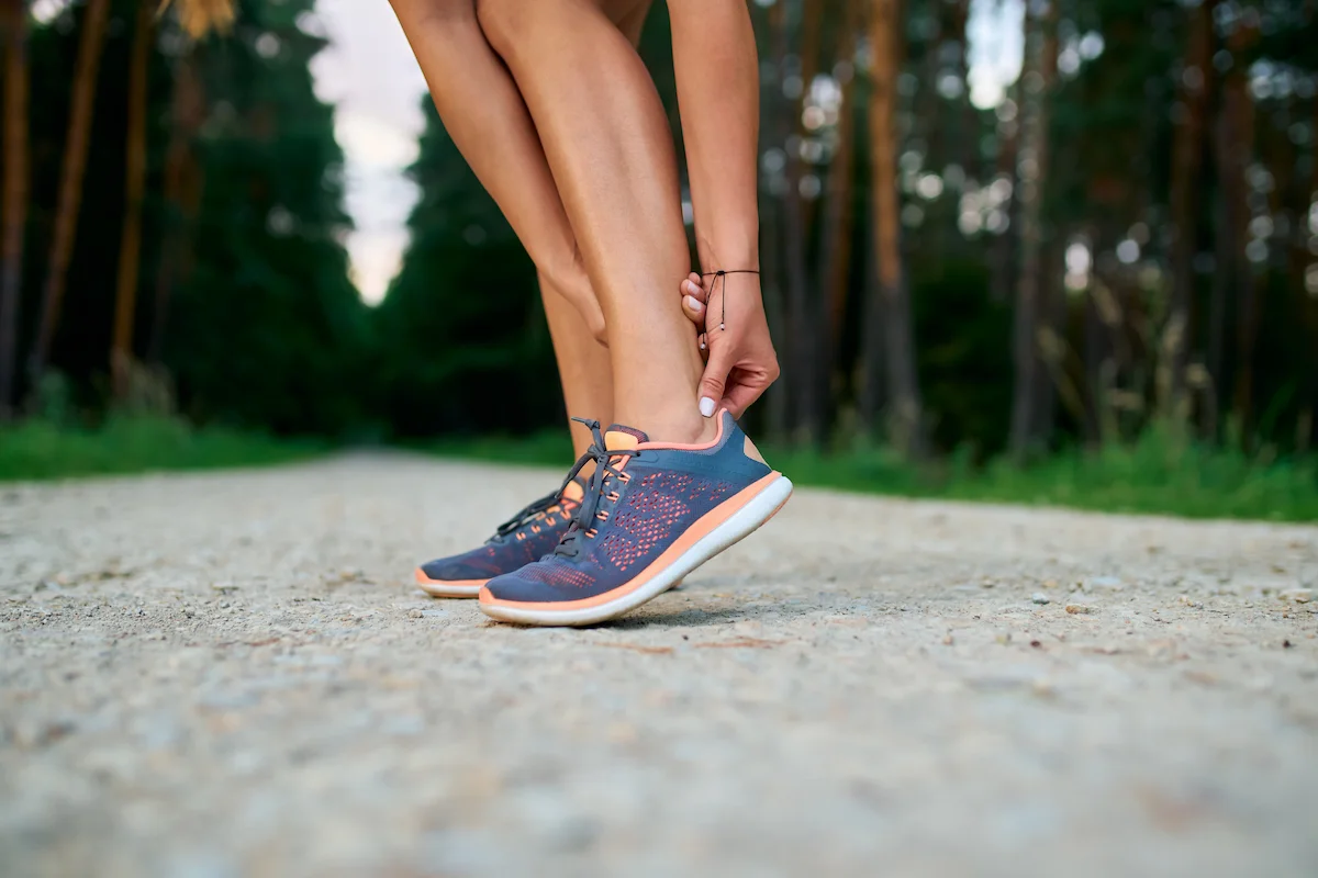 A woman with tendonitis in foot